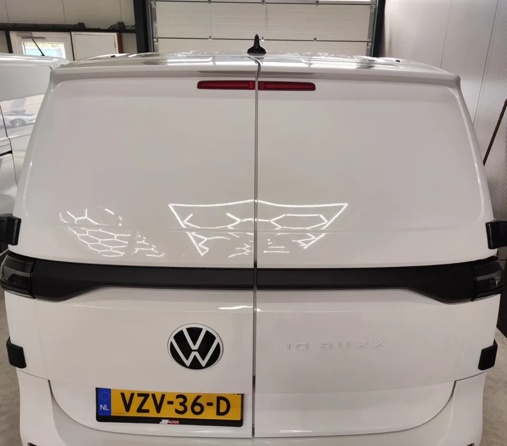 Achterruit belettering — voor behandeling